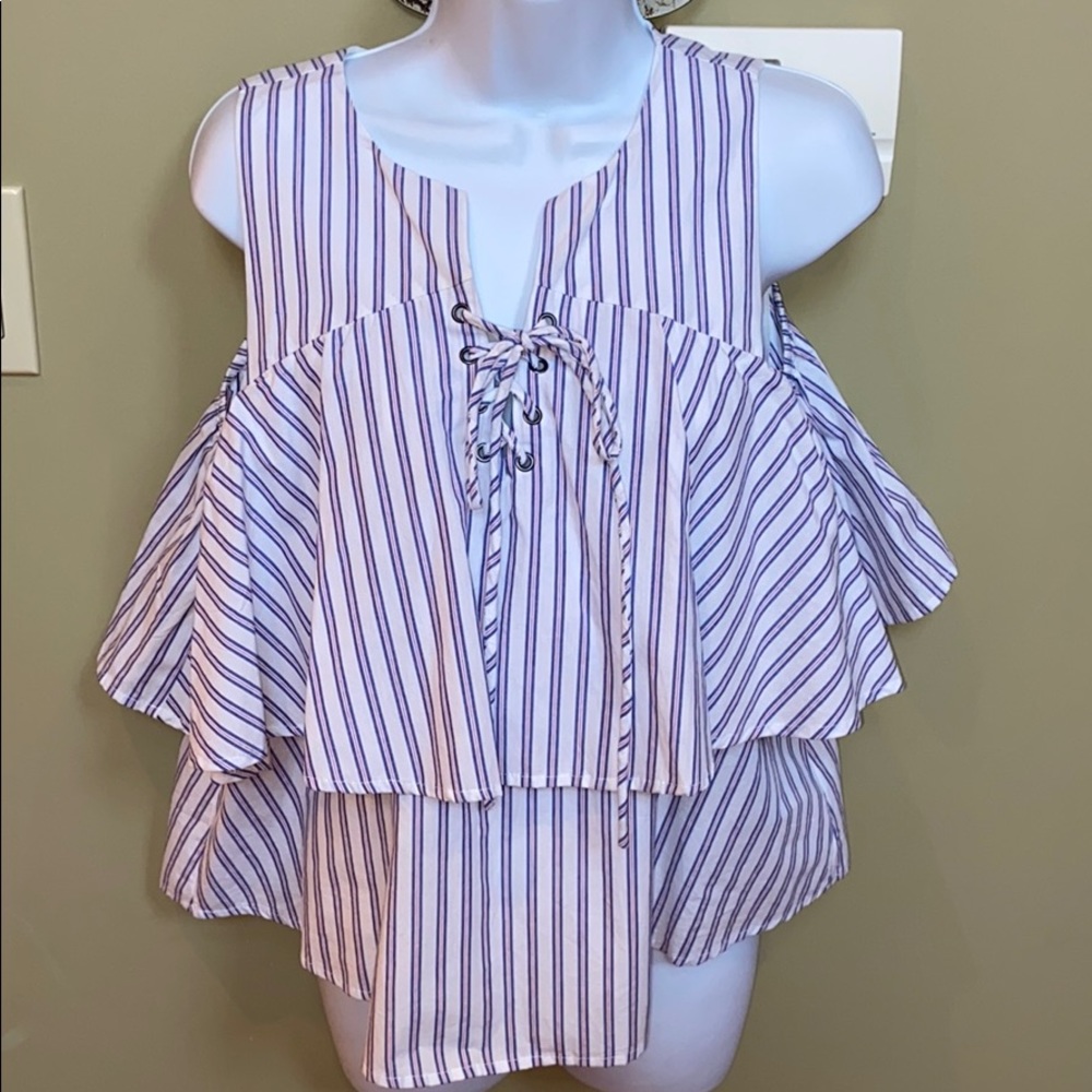 Top from Cella’s Boutique in New Orleans, LA.